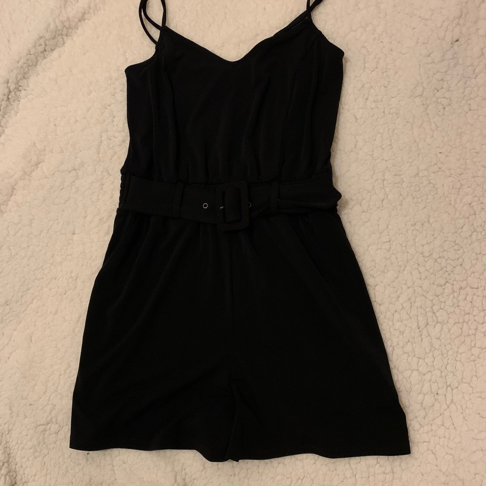 Black Express Romper with a Belt.